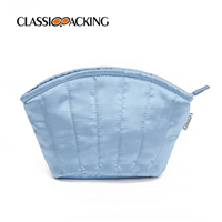 blue clamshell makeup bag