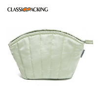 green clamshell makeup bag