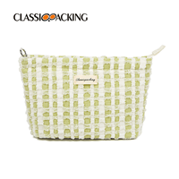 green and white checkered toiletry bag