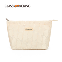 white designer womens toiletry bag